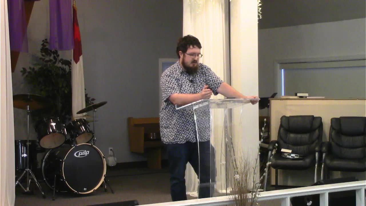 Pastor Adam preaching from Ezekiel 8, 9, 10 & 11