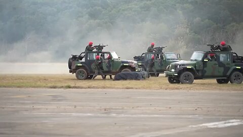 Taiwan holds military drills with armored vehicles and attack helicopters