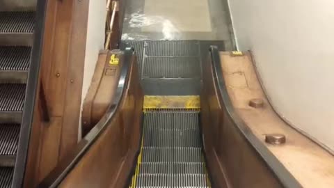 Oldest escalator in the world - Macy's NYC