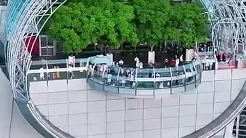 On the Skybridge of Raffles City Drone video 🤗🤩