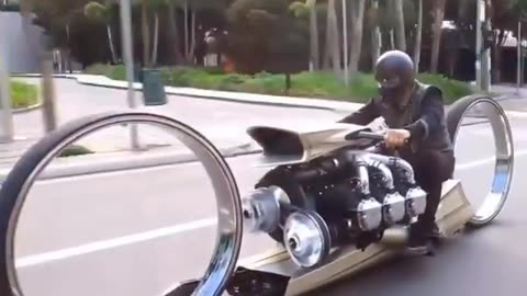 THE TMS DUMONT IS A HUBLESS MOTORBIKE POWERED BY A 224W ROLLS ROYCE AIRCRAFT ENGINE