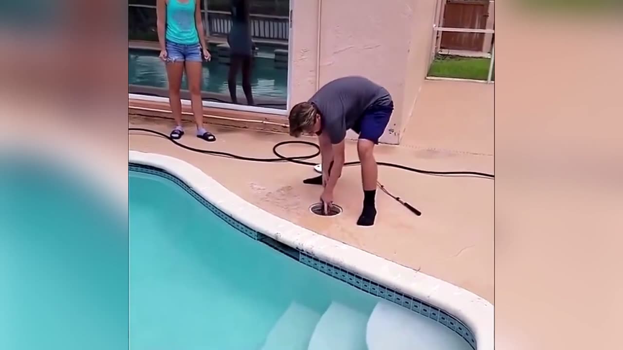 Brave Young Man Removes SNAKE From The Pool 🐍😳