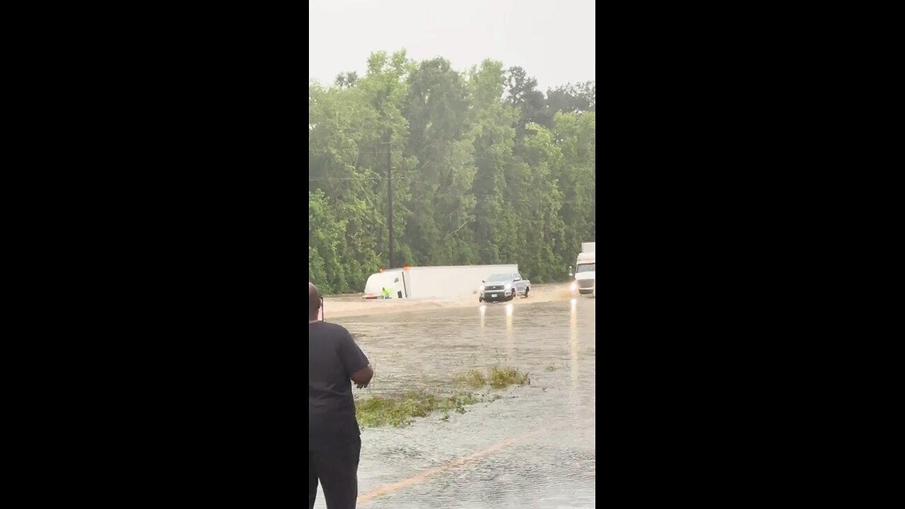 Tractor Trailer Tries To Drive Through Flooded Area!! Must See