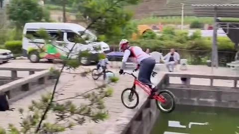 You'll be amazed by this cycling stunt! 😱 #Trending 📺 #ViralVideo 😂 #FunnyVideos 🎥 #Shorts 📈 #Growth