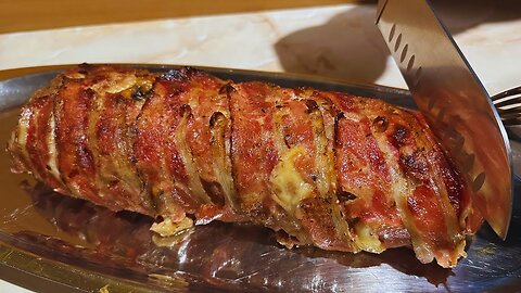 Impress your guests! Juicy minced meat roll wrapped in bacon.