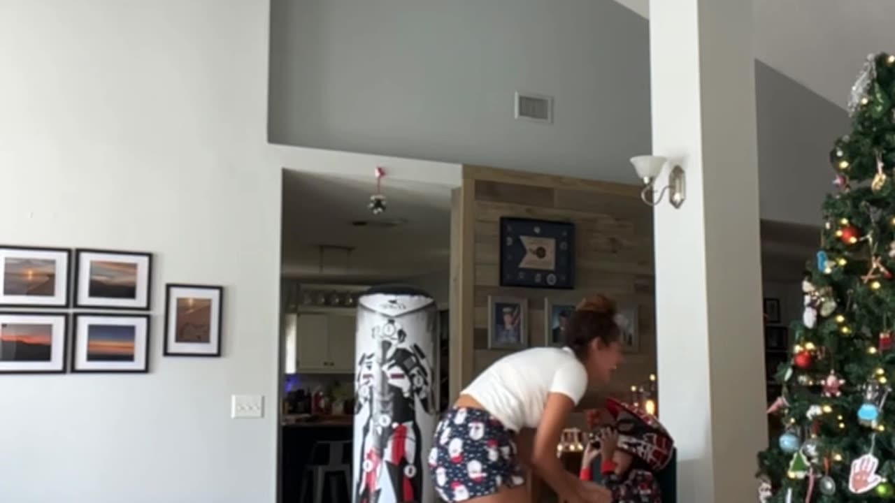 Girl Kicks Inflatable Punching Bag Into Child