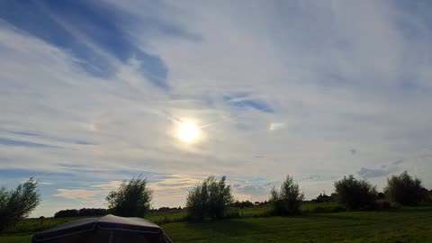 Sundog due to Chemtrails. Holland. Round prisma (firmament)