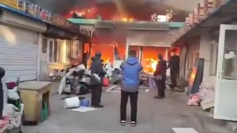 MARKET FIRE IN CHINA KILLS 8, INJURES 15