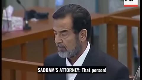 Who remembers? Saddam Hussein reacts to his own death sentence...