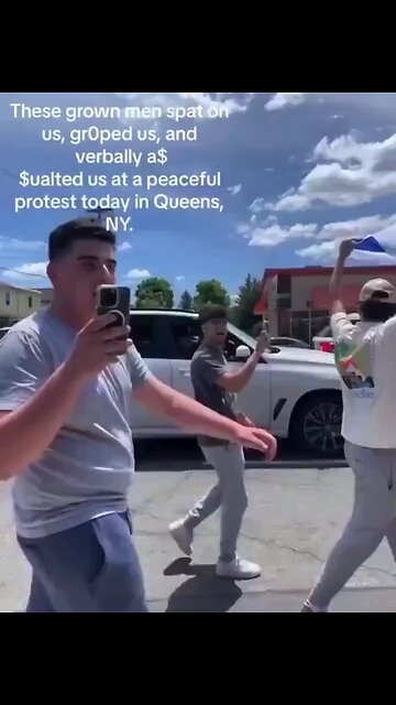 Zionist spits on a black woman and calls her a n*gga