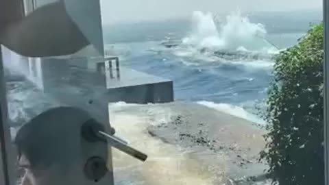 A rooftop pool on a high-rise in Thailand sways intensely after a strong earthquake in Myanmar.