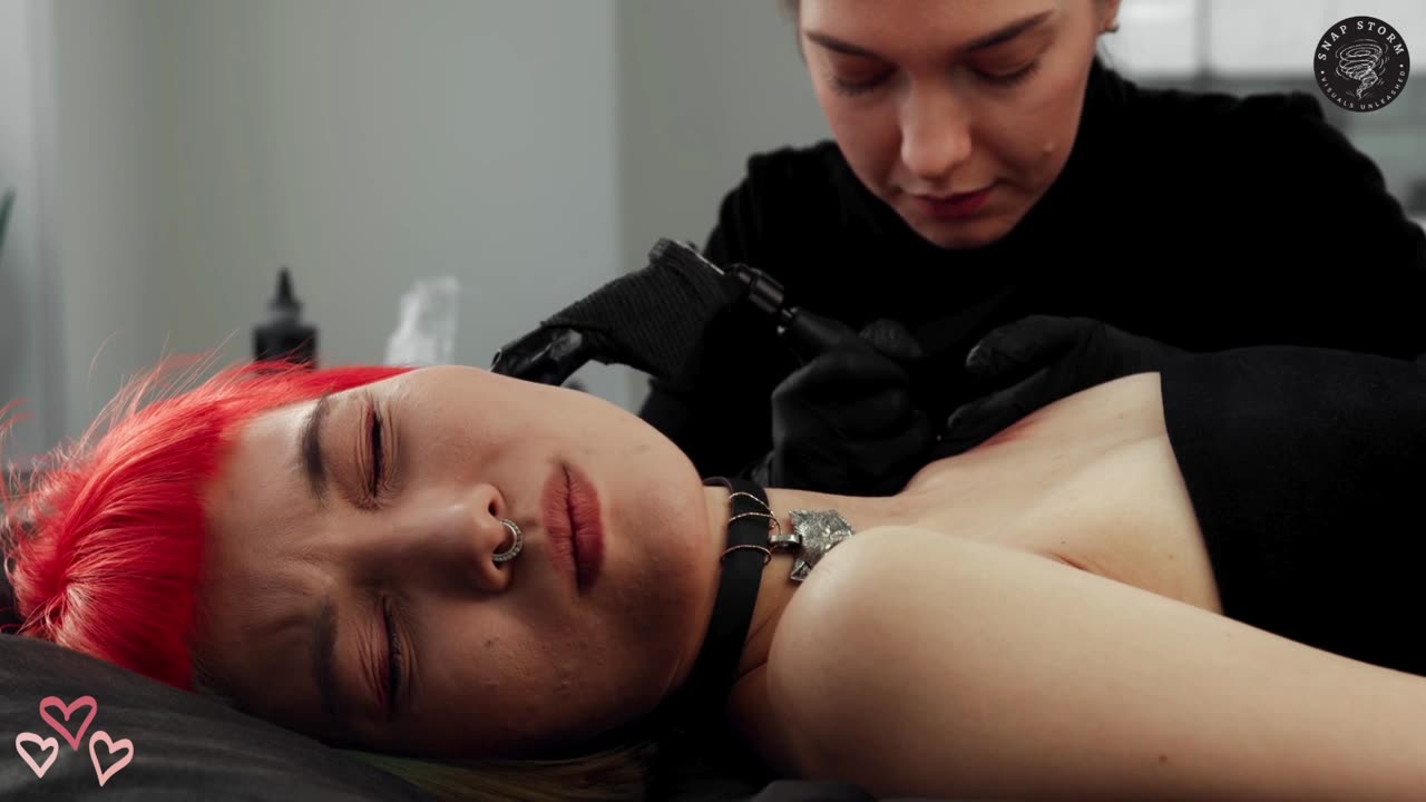 Beautiful Red Head Girl Getting Tattooed