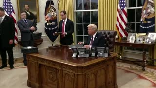 Trump pardons Jan 6rs, signs executive actions in Oval Office