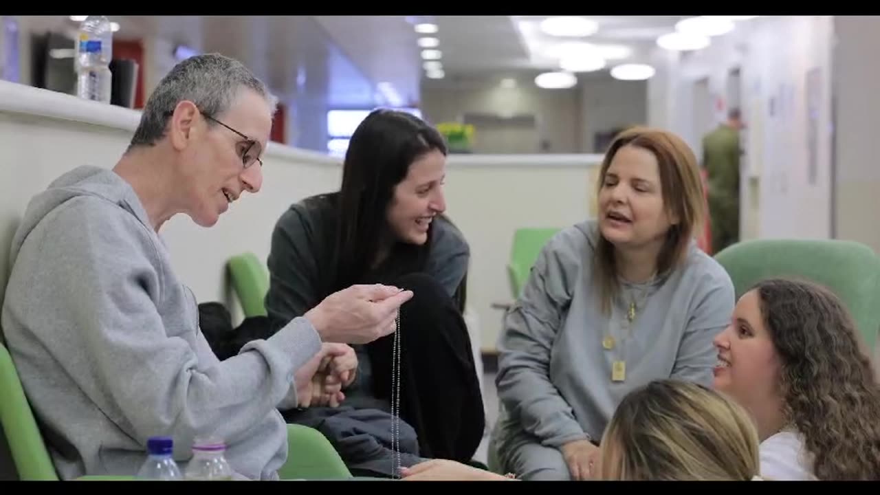 Released hostage Ohad Ben Ami reunites with his daughters Yuli, Natalie, and