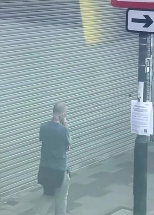 African walks down the street with a saw.. whiteys just ignore him