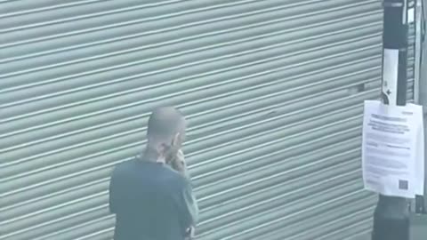 African walks down the street with a saw.. whiteys just ignore him