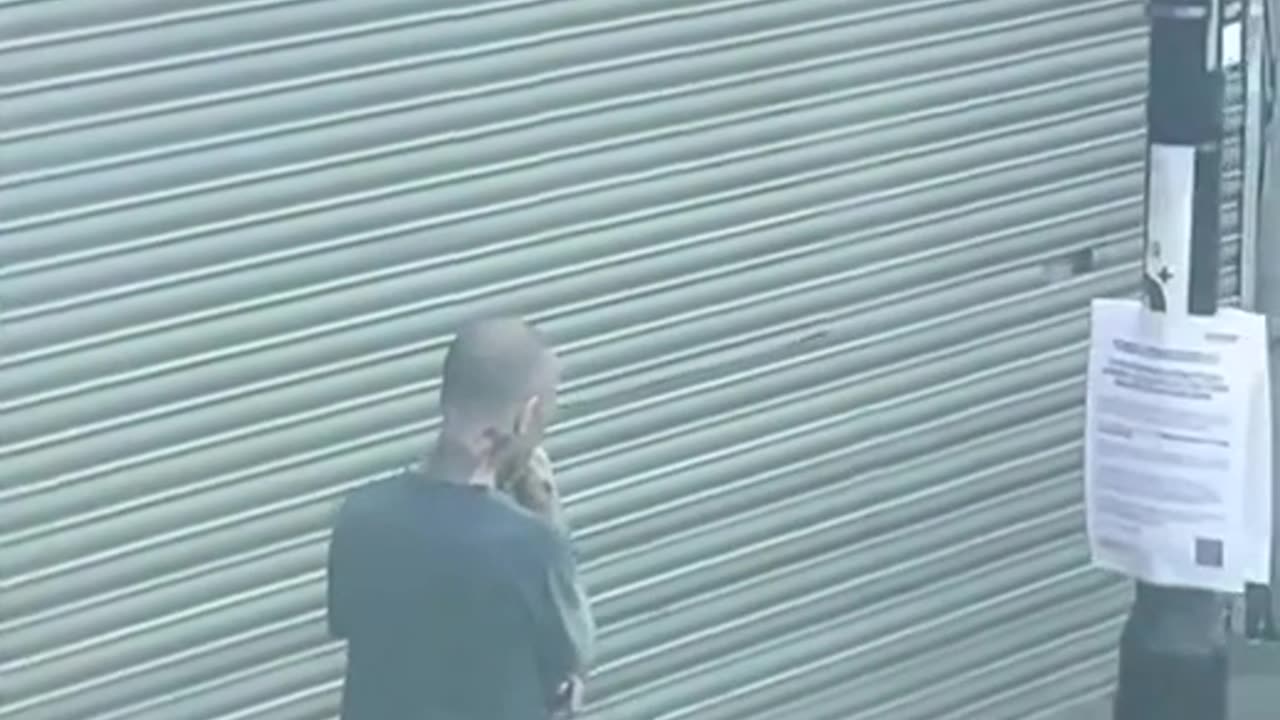 African walks down the street with a saw.. whiteys just ignore him