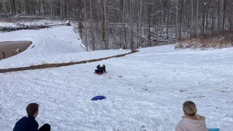 Sledding Into a Creek With Friends