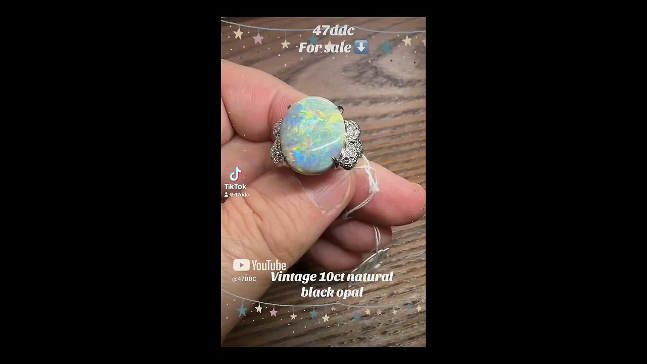 Vintage 10ct natural black opal and diamond platinum ring