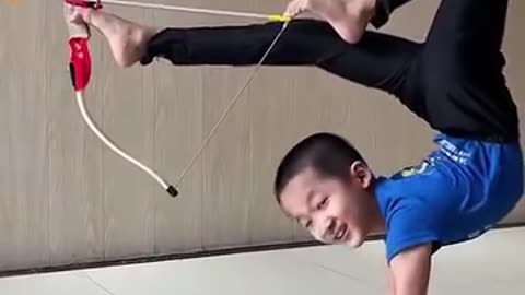 Very talented and flexible little boy