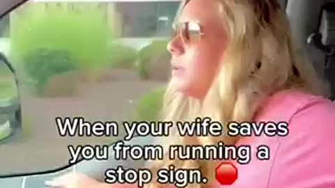 Wife saves him from running stop sign