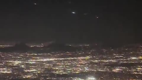 Mysterious Orbs or Drones Seen On Plane