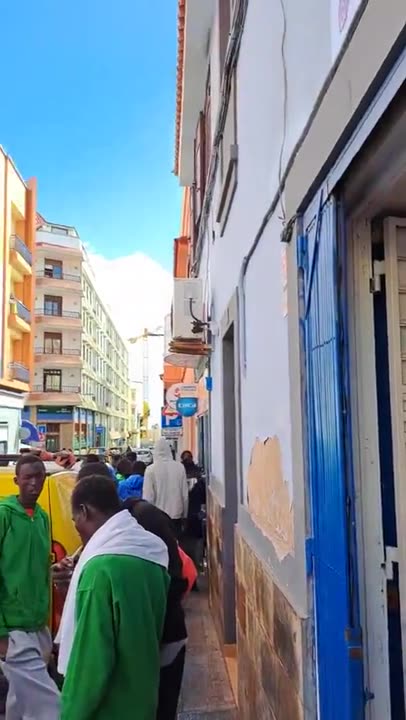 More African migrants who just "HANG out" all day in the street...