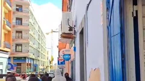 More African migrants who just &quot;HANG out&quot; all day in the street...