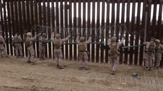 U.S. Marines reinforce southern border wall to assist CBP with border security mission, B-Roll.