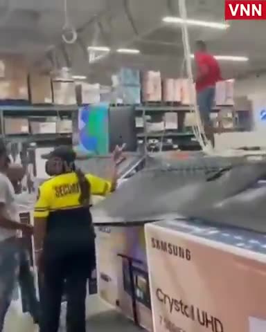 Nigger King Kong wrecks 1000 s of TV s in Costco.mp4
