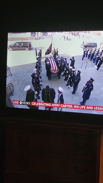 Windy with flakes flying