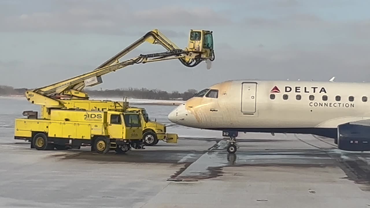 De-Icing Planes In Freezing Weather