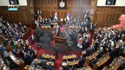 NOW - Chaos erupts in the Serbian parliament.