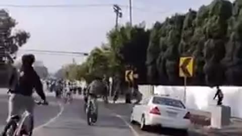 Mercedes drives through bicyclists in LA.