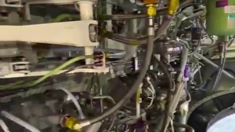 Looking through the main landing gear wheel well of a Boeing 737