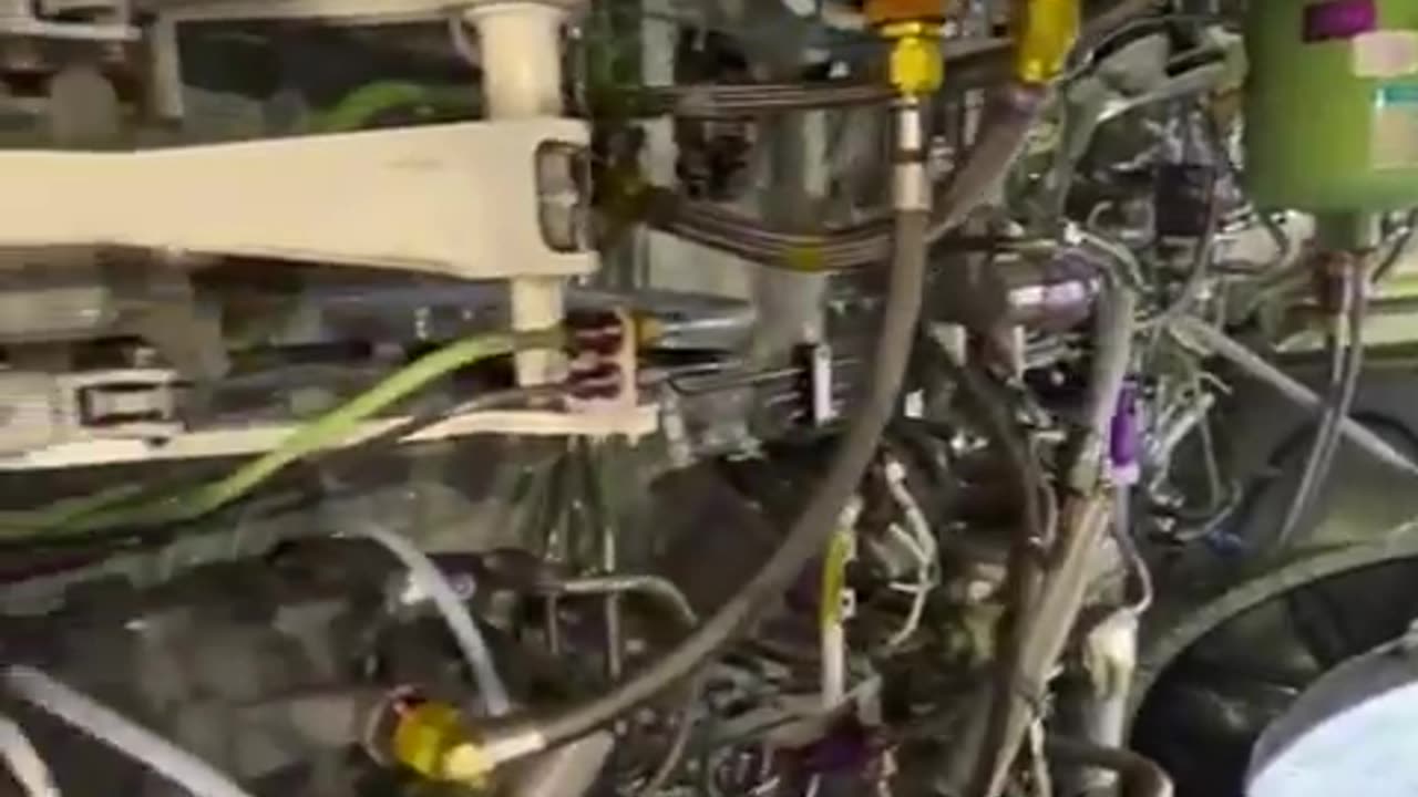Looking through the main landing gear wheel well of a Boeing 737