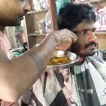 Vivek 'shit the street' Ramaswamy getting a haircut back home