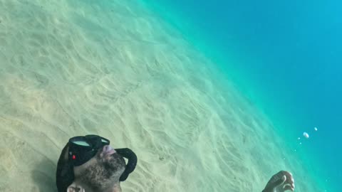 Snorkeler Swims Through Blown Bubble