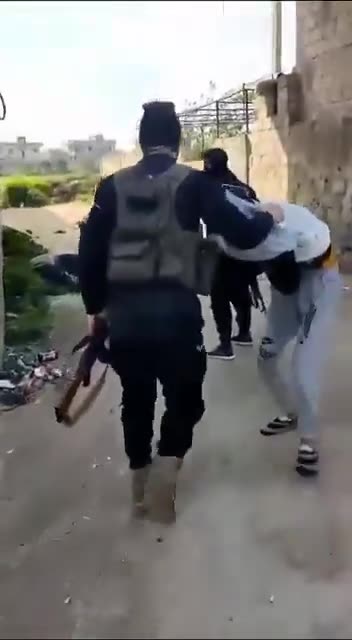 footage of HTS publicly executing civilians