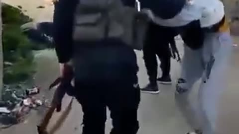 footage of HTS publicly executing civilians