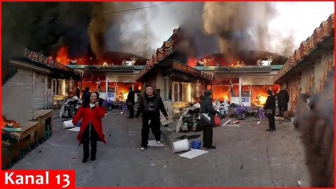 A fire at a food market in northern China kills at least 8 and injures 15