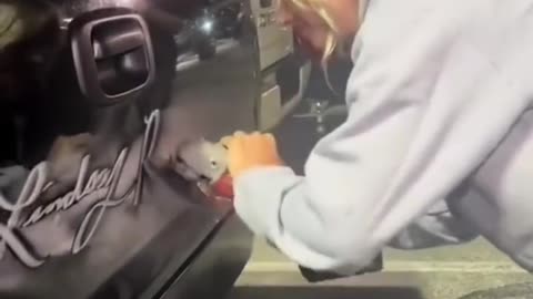 Calligraphy on car with grinder