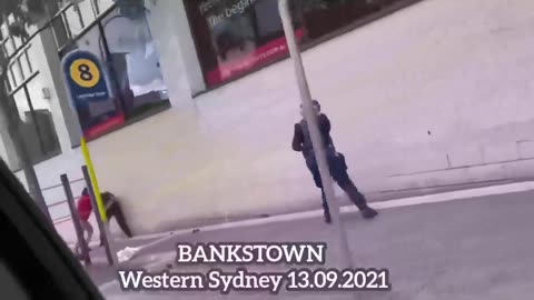 Female cop does nothing as partner gets beat up by savage knee grow in Australia LOL