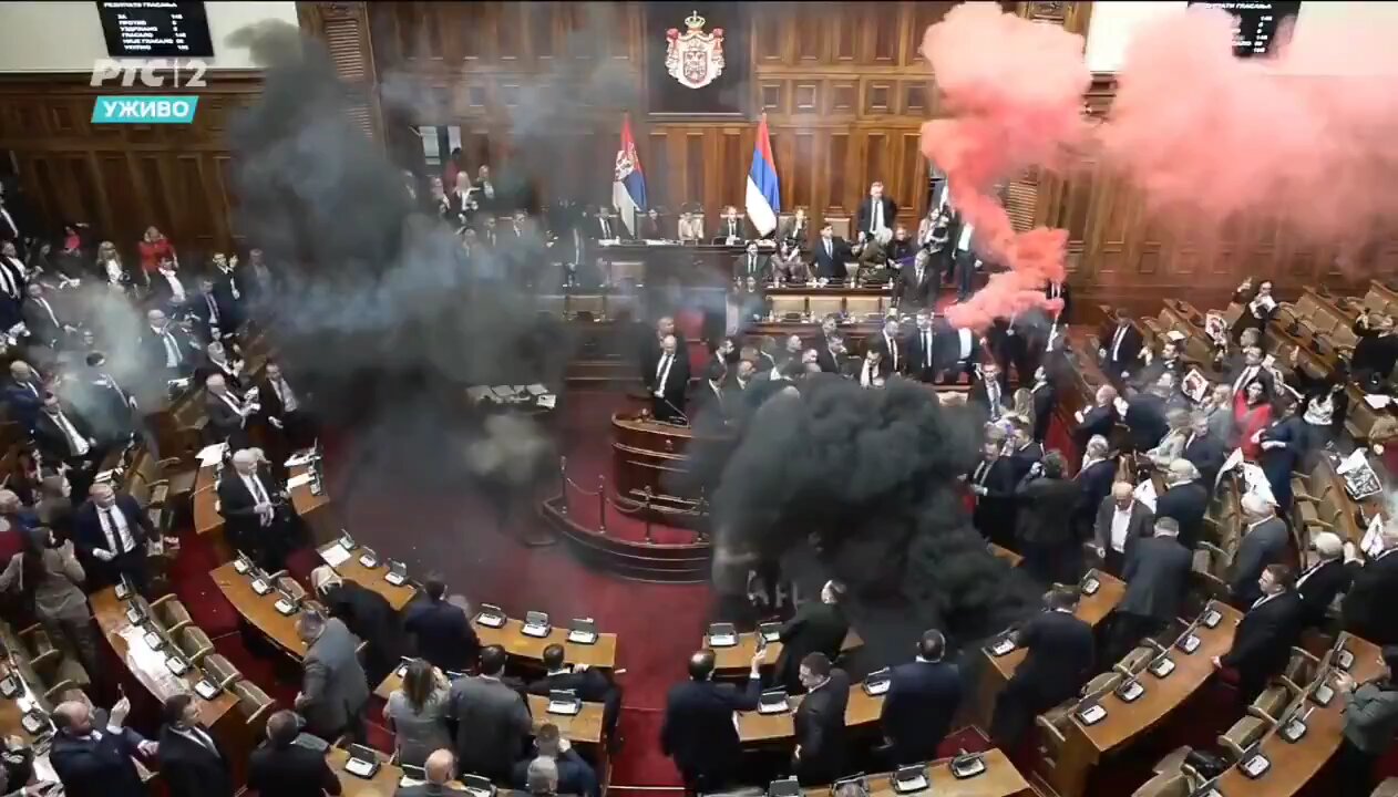 Disorder breaks out in the Serbian parliament.