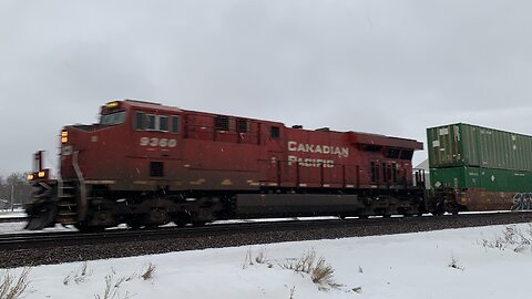 Canadian Pacific 9360 train engine with surprise DPU