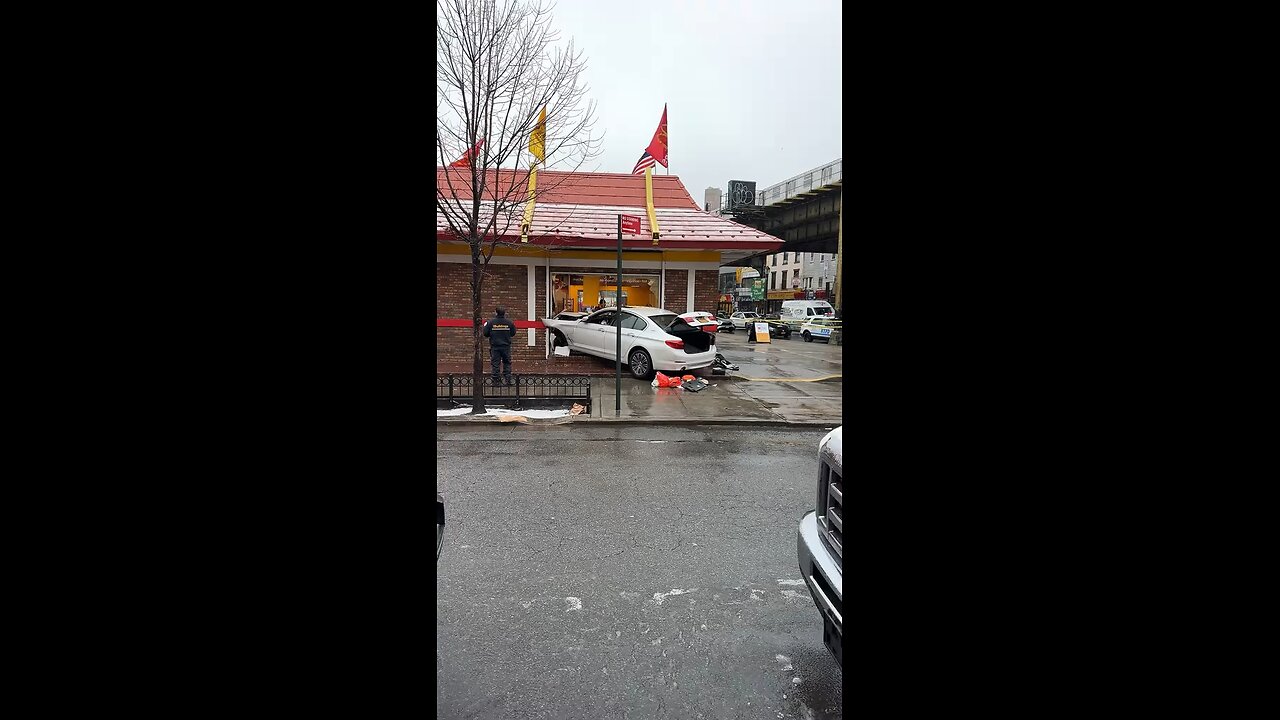 Wild scene at a NYC McDonald's as a car crashes into the restaurant!