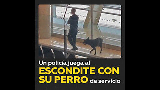 Captan a un agente jugando al escondite con su perro policía