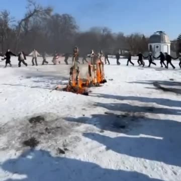 High School Students in Occupied Donetsk Dance Around Burning Effigies of EU Leaders