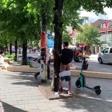 Muslim or pajeeet pissing in public with his buttcheeks out as people white people walk