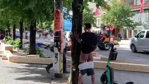 Muslim or pajeeet pissing in public with his buttcheeks out as people white people walk